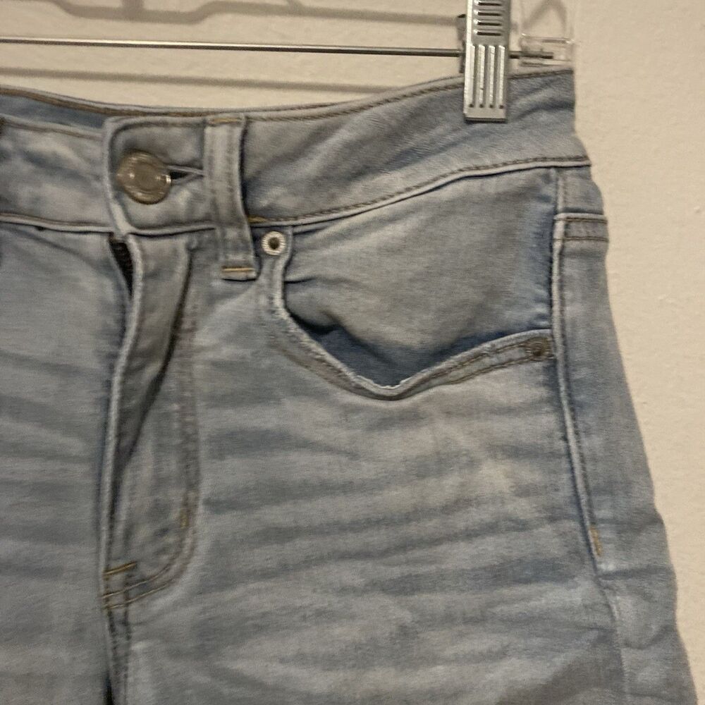 AMERICAN EAGLE OUTFITTERS Next Level Stretch light wash zip fly cut off shorts 6 - Picture 4 of 12